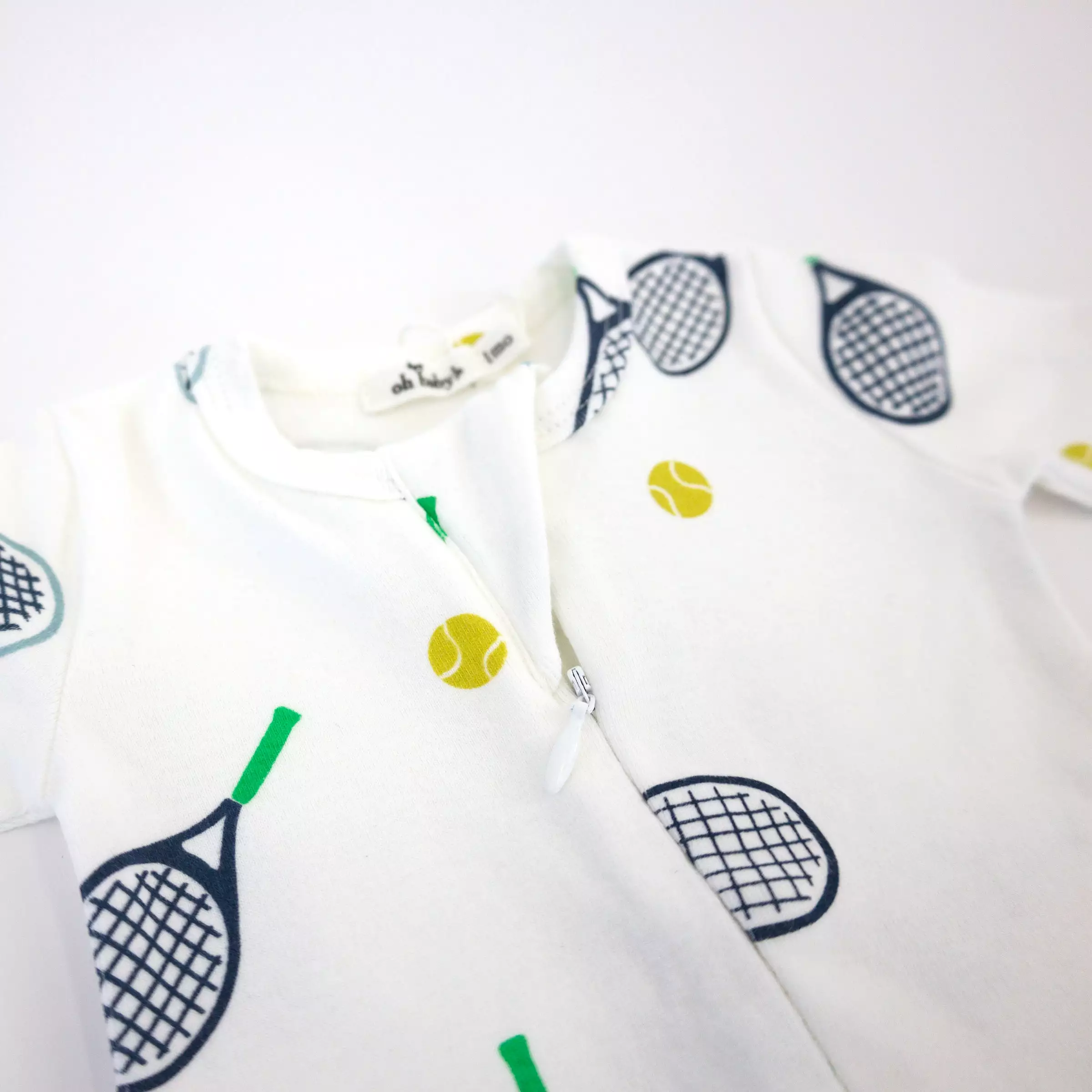 oh baby! Cotton Baby Rib Zipper Footie - Tennis Print - Cream